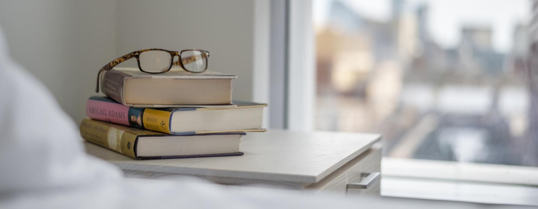 a stack of books on a table