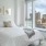 a bedroom with a large window