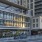 a tall building with a glass front