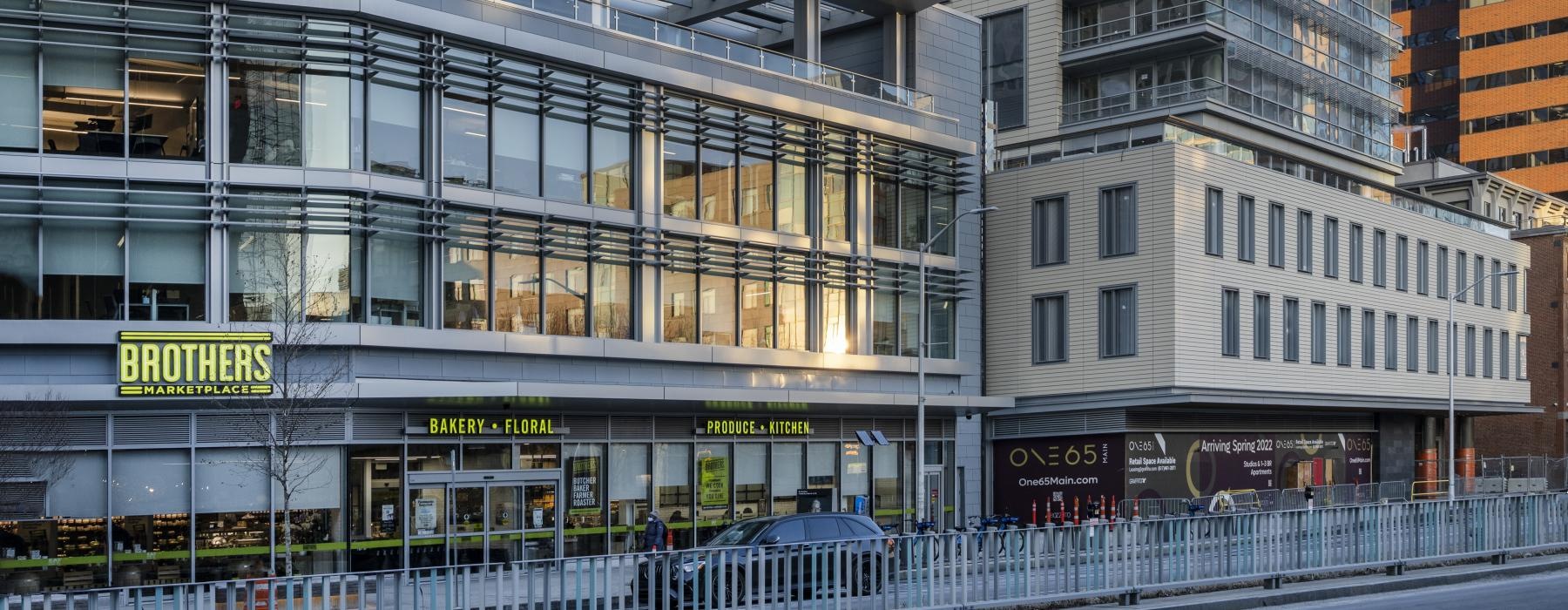 a tall building with a glass front