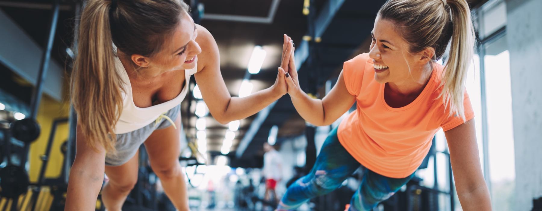 a couple of women working out