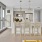 a kitchen with a dining table and chairs