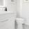 a bathroom with a toilet and sink